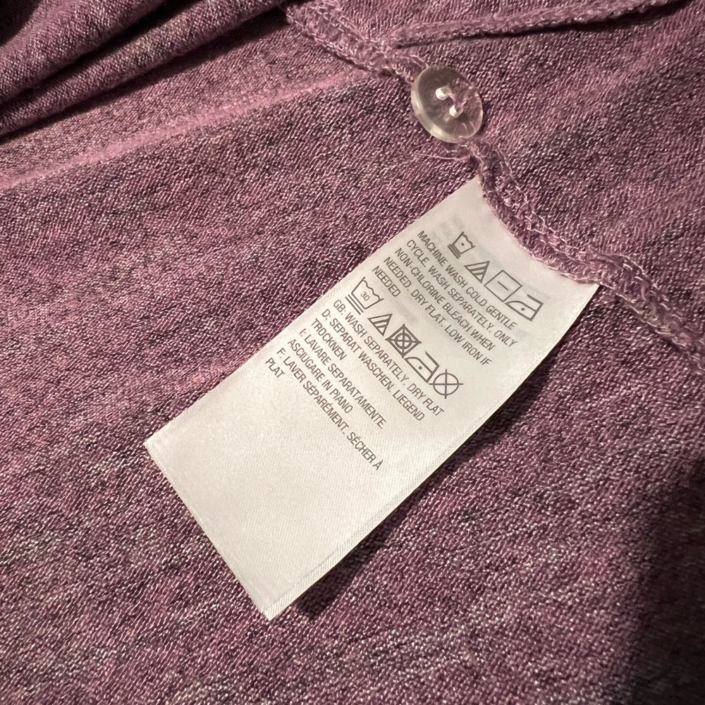 Woman’s XL Cardigan Logo brand purple.